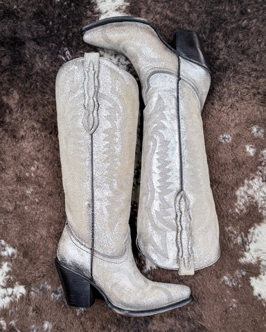 The Steel Spirit Corral Boots displayed on cowhide.