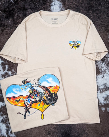 The Buffalo Heart Hooey T-Shirt displayed on cowhide, showing the graphic design on the back.
