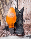 Front and bottom of the Dahlia Dust Corral Boots with a wood backdrop.