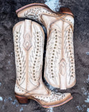 The Phantom Dune Corral Boots displayed on cowhide.