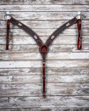 Turquoise Rawhide Breast Collar displayed on a wood background.