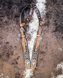 Crystal Collection Double Ear Headstall displayed on cowhide.