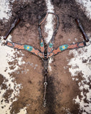 Beaded Cactus Breast Collar and One Ear Headstall displayed on cowhide.