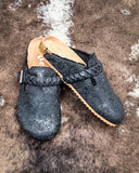 Iris Tooled Slip on Mule in Black by Very G displayed on cowhide.