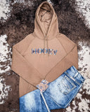 Trophy Ladies Hooey Hoodie in Shitake Brown styled with Cowgirl Tuff jeans on cowhide.