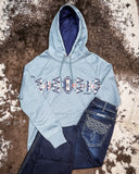 Ladies Legendary Hooey Hoodie in Blue Polar Fleece styled with Cowgirl Tuff jeans on cowhide.