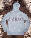 Back view of the Ladies Legendary Hooey Hoodie in Blue Polar Fleece styled on cowhide.