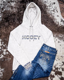 Trophy Ladies Hooey Hoodie in Oatmeal with Cowgirl Tuff Jeans on cowhide.