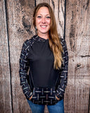 Cinched Up T-Shirt Hoodie on a model in front of a wood backdrop.