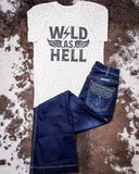 Wild As Hell Graphic Tee displayed and styled on hide background.