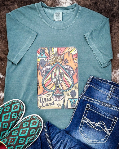 Tee on Cowhide rug with shoes and pants 