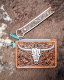 The Pride of Prickly Pears Card Holder in Dark Brown displayed on cowhide.
