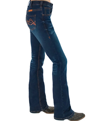 A side profile view of a person wearing dark blue western flare jeans with orange embroidery on the back pocket, paired with dark cowboy boots, against a plain white background.