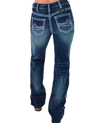 Rusty brand blue denim jeans shown from the back on a model, featuring decorative white embroidery on the back pockets and contrast stitching.