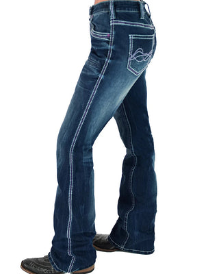 Blue jeans worn by a person on a white background