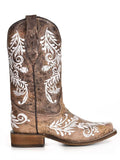 side of boots on white backdrop