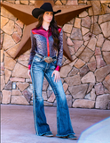 Model wearing jeans and rodeo top.