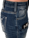 Close up of the side of the boot cut jeans on the model.