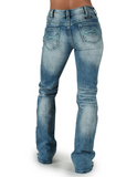Back view of model wearing boot cut jeans