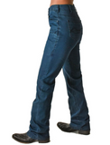 Left side view of model wearing boot cut jeans.