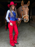 Model wearing trouser jeans with a horse.