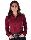 Front view of a girl wearing the  Garnet Grit Pullover Button Up in a white back drop.