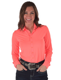 Front view of a girl wearing the Spur and Spark Pullover Button Up in a white back drop.