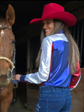 Back view of a model wearing the  Stars Stripes and Rodeo Nights Pullover next to a horse.