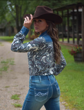 Back view of a model wearing the Ranch Ready Pullover Button Up in a park.