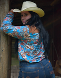 Model leaning on a post, showing back of the Ranch Ready Pullover Button Up.