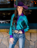 Model wearing the  Rodeo Royale Pullover Button Up in front of a building.