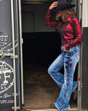 Model wearing the Cowgirl Tuff Blazn' Red Trouser Jeans.