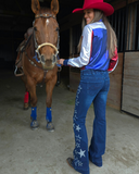 Model wearing the Cowgirl Tuff Pull-On Star Trouser holding a horse.