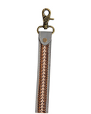 Diamond Shine Hand-Tooled Strap Key Fob in a white back drop.