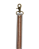 Diamond Shine Hand-Tooled Strap Key Fob in a white back drop.