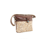 Side view of the Fennington Leather Bag in Ivory in a white back drop.
