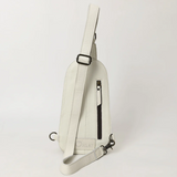 Stock photo of the back of the Ridge Bloom Tooled Sling Bag - Ivory.