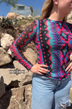 Retro Funk Mesh Top styled and modeled on a women in desert setting.