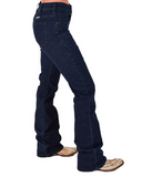 Dark blue jeans worn by a person on a white background
