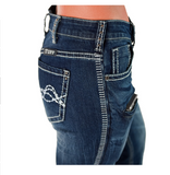 Close-up of blue jeans with visible branding on a white background