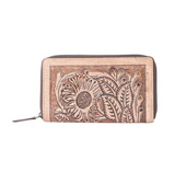Brown leather wallet with floral embossing on a white background