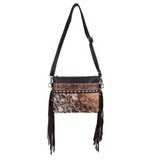 The Ardelle Hair on Hide Fringe Crossbody Bag in a white back ground.