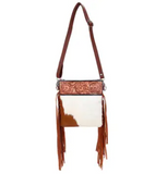 The Lariat Hair on Hide Fringe Crossbody Bag in a white back ground.