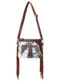 The Quill Hair on Hide Fringe Crossbody Bag in a white back ground.