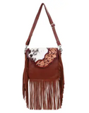 The Loralei Hair on Hide Fringe Crossbody Bag in a white back ground.