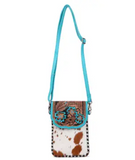 The Lark Hair on Hide Phone Crossbody Bag in a white back ground.