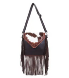 The Mae Hair on Hide Fringe Crossbody Bag in a white back ground.