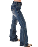 The bottom half of a girl wearing the Dare Me Trouser Jeans. She is standing sideways to show the side seams of the jeans. She is in a white back ground.
