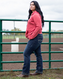 Model wearing Denim Flannel jeans behind gate 