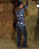 Model wearing Denim Flannel jeans Hay stack behind 